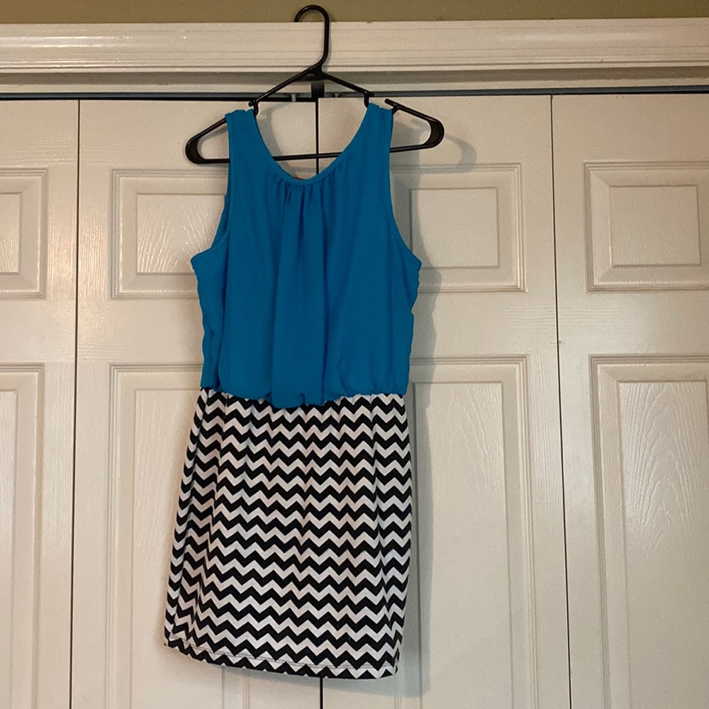 Dress with blue top with black and white striped bottom